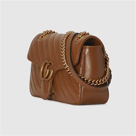 borsa portabottiglie pelle marrone gucci|Borsa GG Matelassé misura piccola in pelle marrone chiaro.